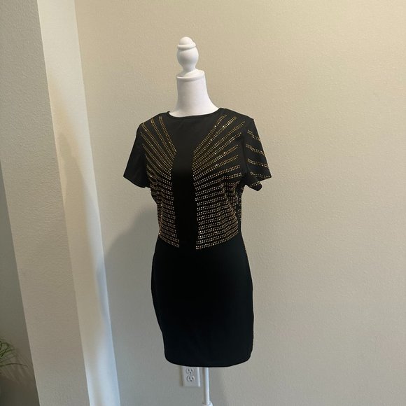 Dresses & Skirts - Beaded black mini-dress